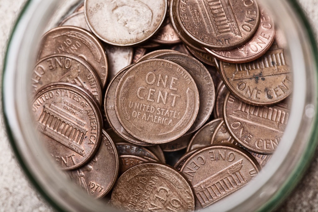 WHY WAS THE COMPOSITION OF THE PENNY CHANGED AND WHY DO WE CONTINUE TO