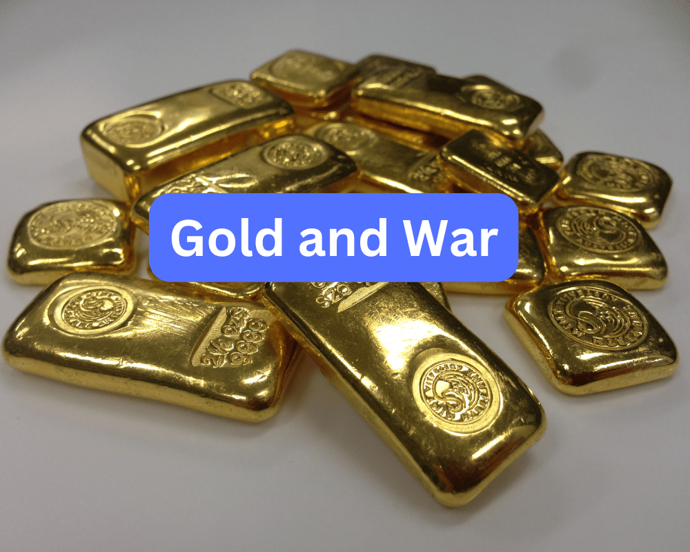 Gold bars in a pile on grey background