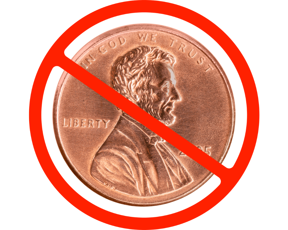 A US penny coin with a red cross through it