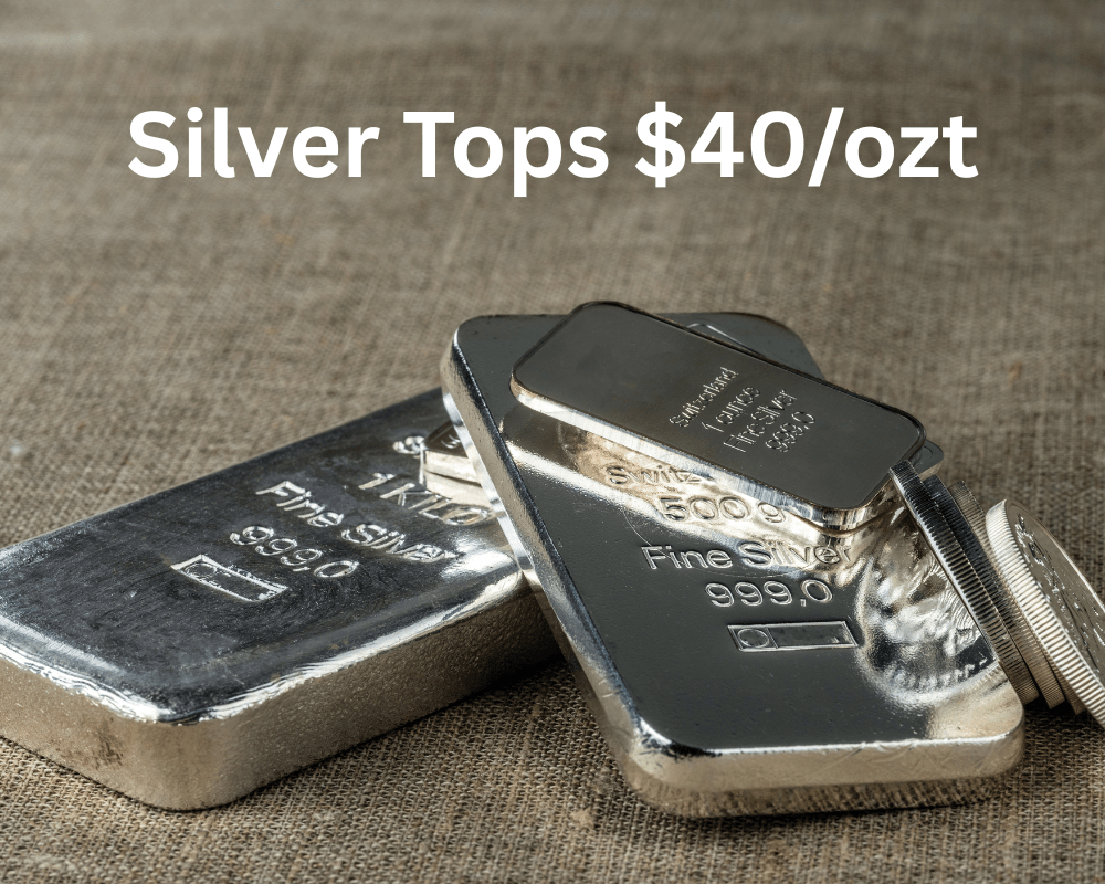stack of silver bars with text reading "silver tops $40/ozt"